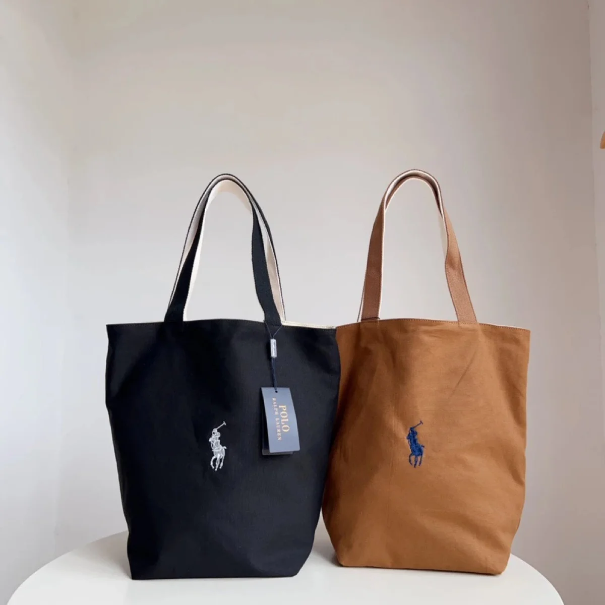 حقيبة Polo Ralph Lauren كبيرة بشعار كلاسيكي بالأسود والبني